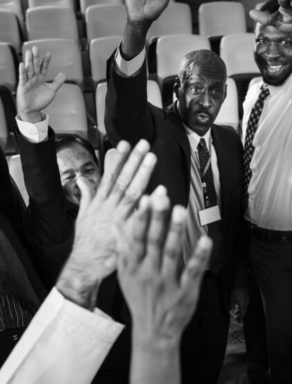 Group of International Business People Raising Their Hands